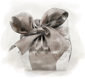 Signature gift box in silver foil with grey ribbon and bow