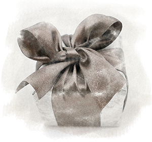 Signature gift box in silver foil with grey ribbon and bow
